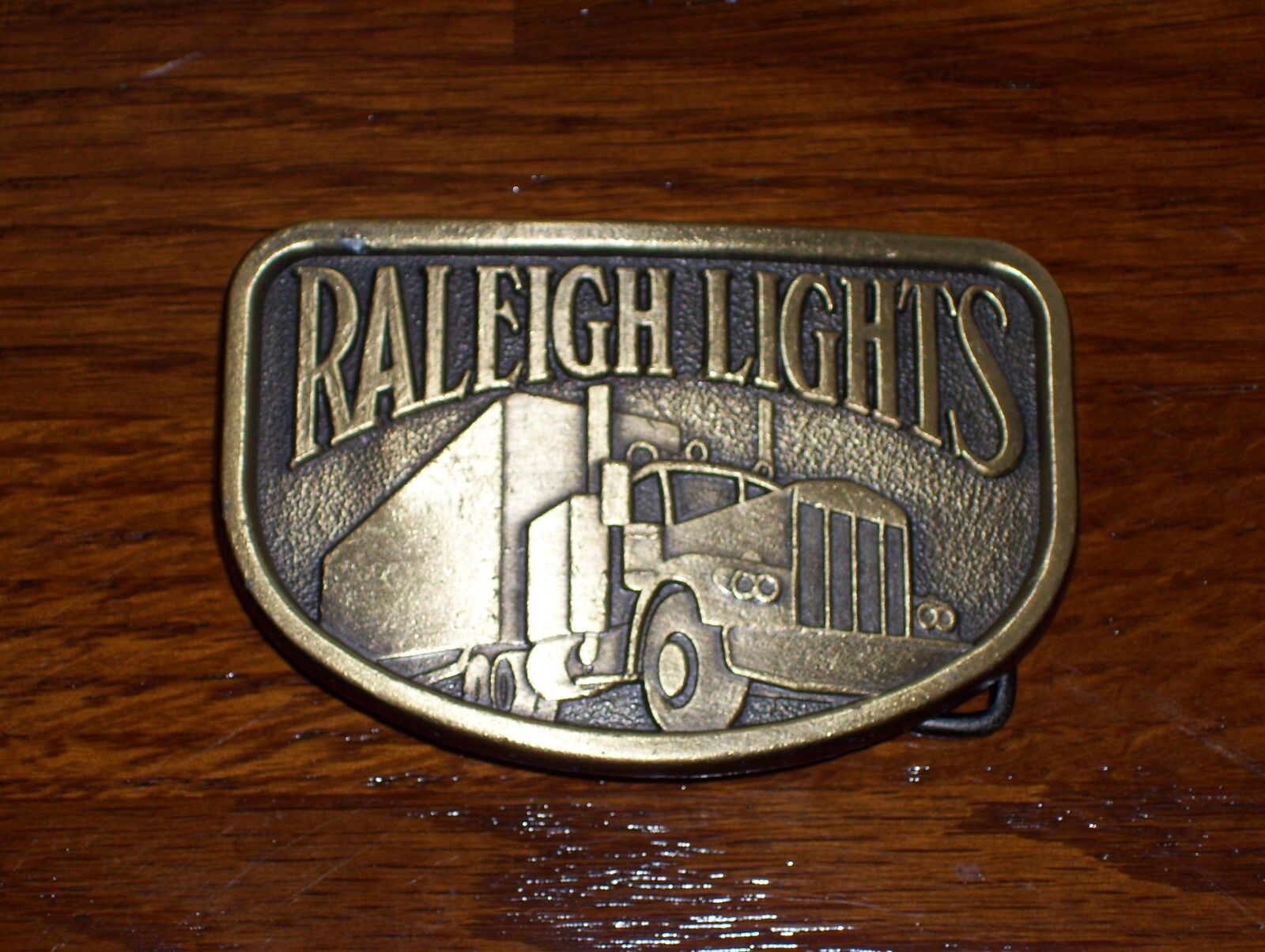 Vintage Raleigh Lights Trucker Gold Tone Belt Buckle.. Look