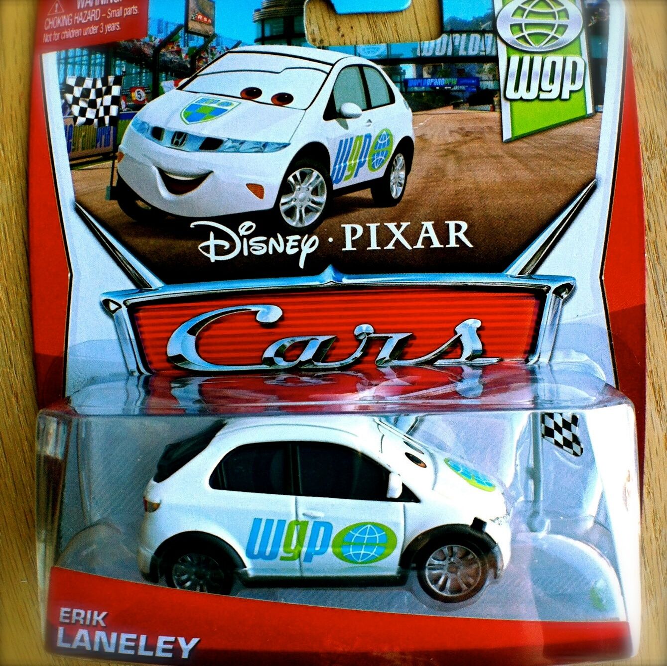 Disney PIXAR Cars ERIK LANELEY on 2013 WGP THEME CARD diecast 9/17 Honda flag