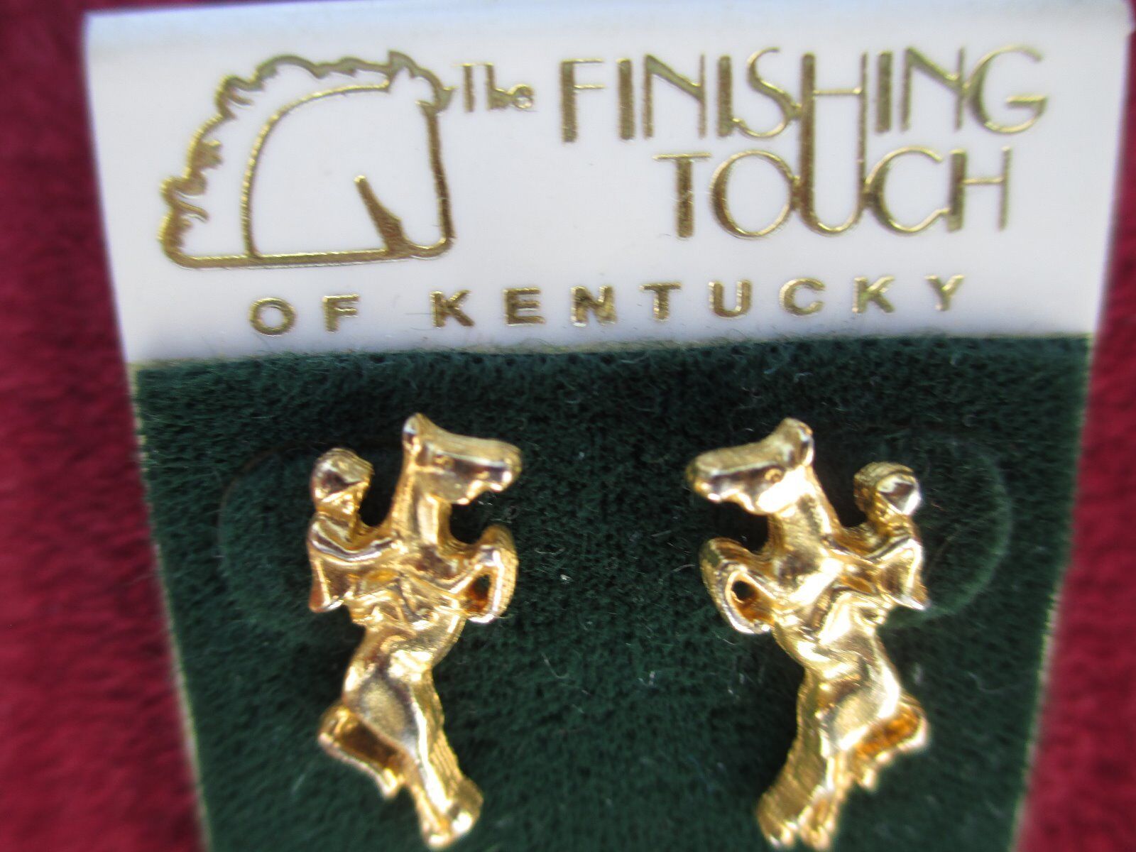 Gold tone pierced earrings, equestrian, horse and rider jumper