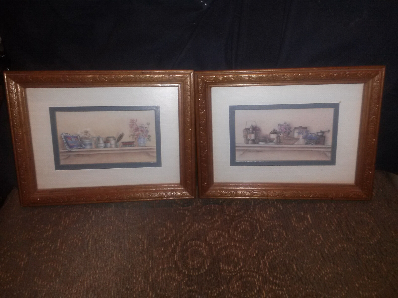 SET OF 2 PRINTS DEPICTING ITEMS ON SHELVES SIGNED BY ARTIST APPROX. 8\