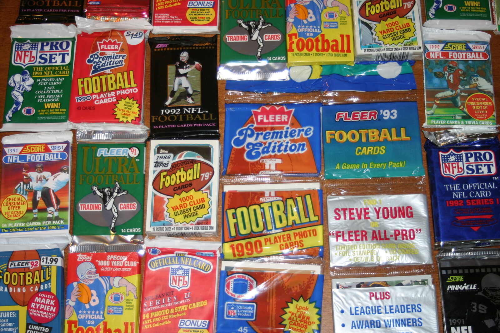 ESTATE LIQUIDATION- LOT OF NEW OLD VINTAGE UNOPENED NFL FOOTBALL CARDS IN PACKS