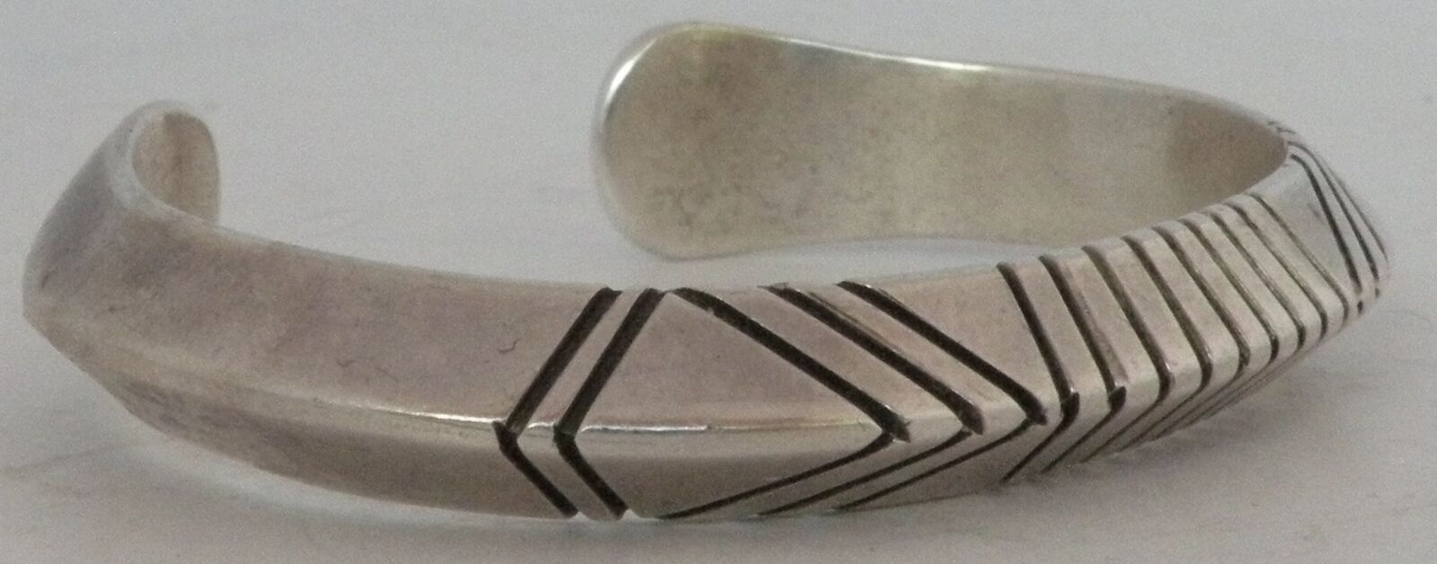San Felipe Pueblo sterling silver carinated heavy cuff bracelet by Raymond Ortiz