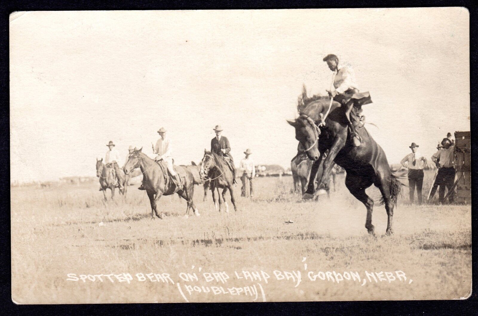 c.1910 RPPC OF LAKOTA INDIAN BRONCO RIDER ~ SPOTTED BEAR ON BAD LAND BAY HORSE 