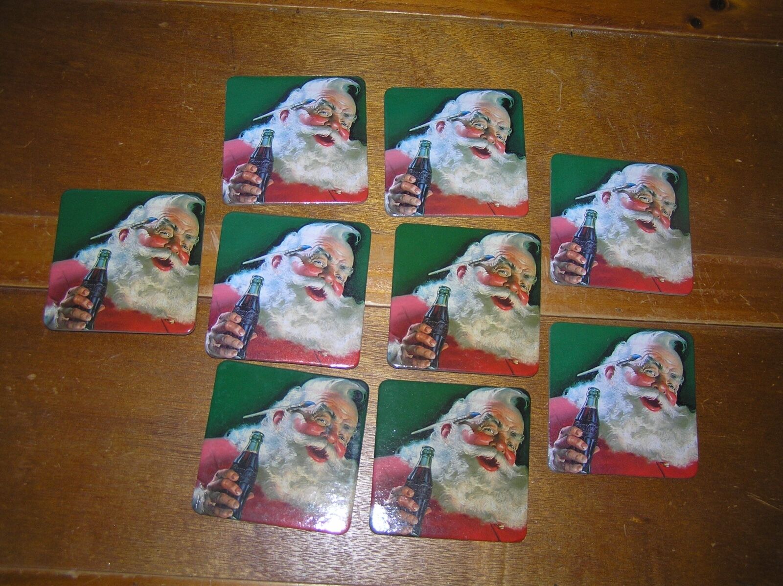 Lot of 8 Vintage Reproduction Santa Claus Drinking Coca-Cola Square Cork Backed 