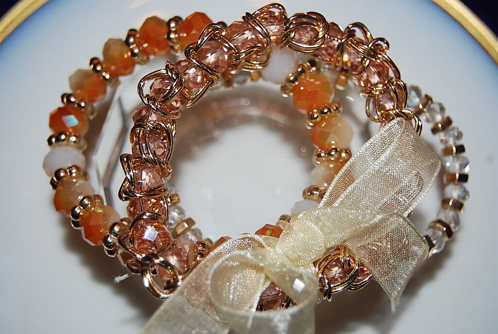 SET OF THREE GOLD TONED METAL CRYSTALS AND NATURAL STONES STRETCH CUFF BRACELETS