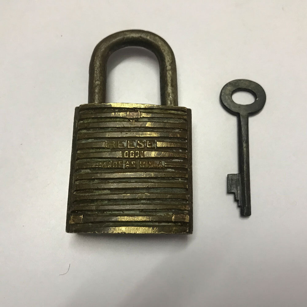 (17). An old or antique solid brass padlock lock with key rich patina