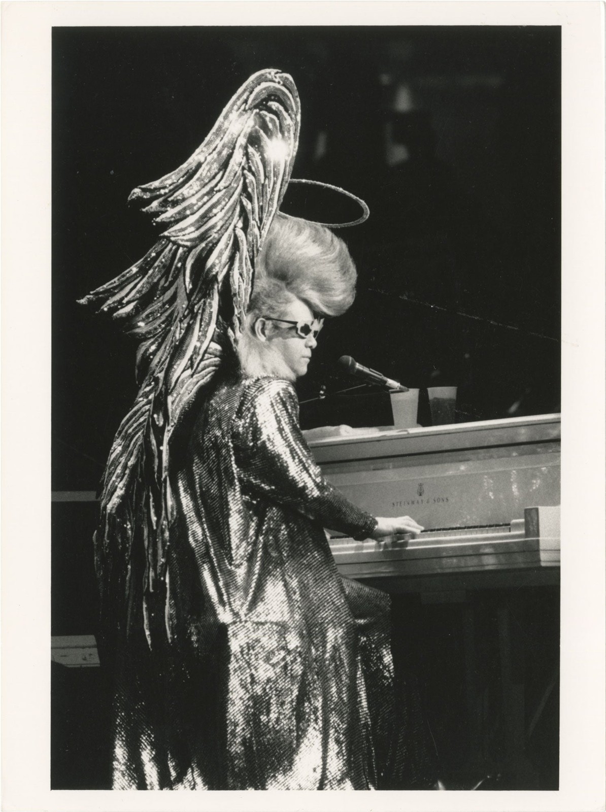 COLLECTION OF THIRTEEN ORIGINAL PHOTOGRAPHS OF ELTON JOHN CIRCA 1970S #156302 COLLECTION OF THIRTEEN ORIGINAL PHOTOGRAPHS OF ELTON JOHN CIRCA 1970S #156302