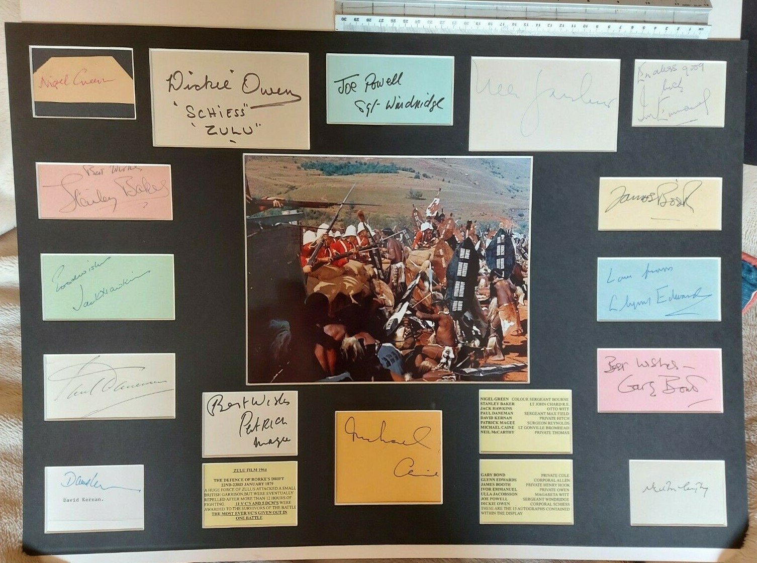 ZULU FILM 1964 MICHAEL CAINE SIGNED BY 15 AUTOGRAPH DISPLAY UACC SCARCE & UNIQUE