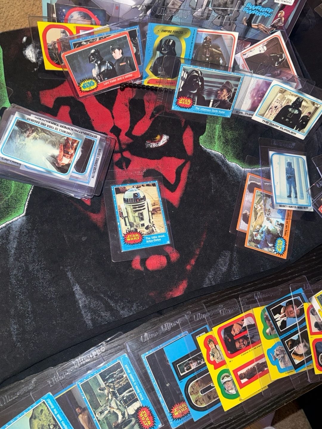 Vintage 1977-1980 Star Wars Trading Cards Lot with Top Loaders including darth V Vintage 1977-1980 Star Wars Trading Cards Lot with Top Loaders including darth V
