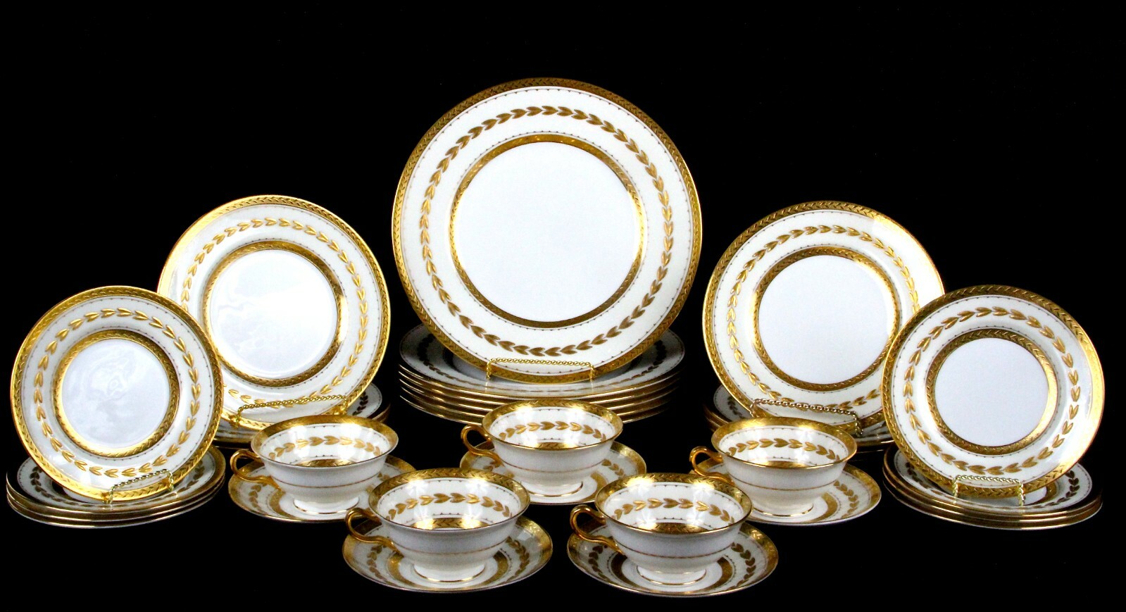 Service for 12 Of Minton England 22-K Gilded Laurel Plates, 62 pieces Service for 12 Of Minton England 22-K Gilded Laurel Plates, 62 pieces