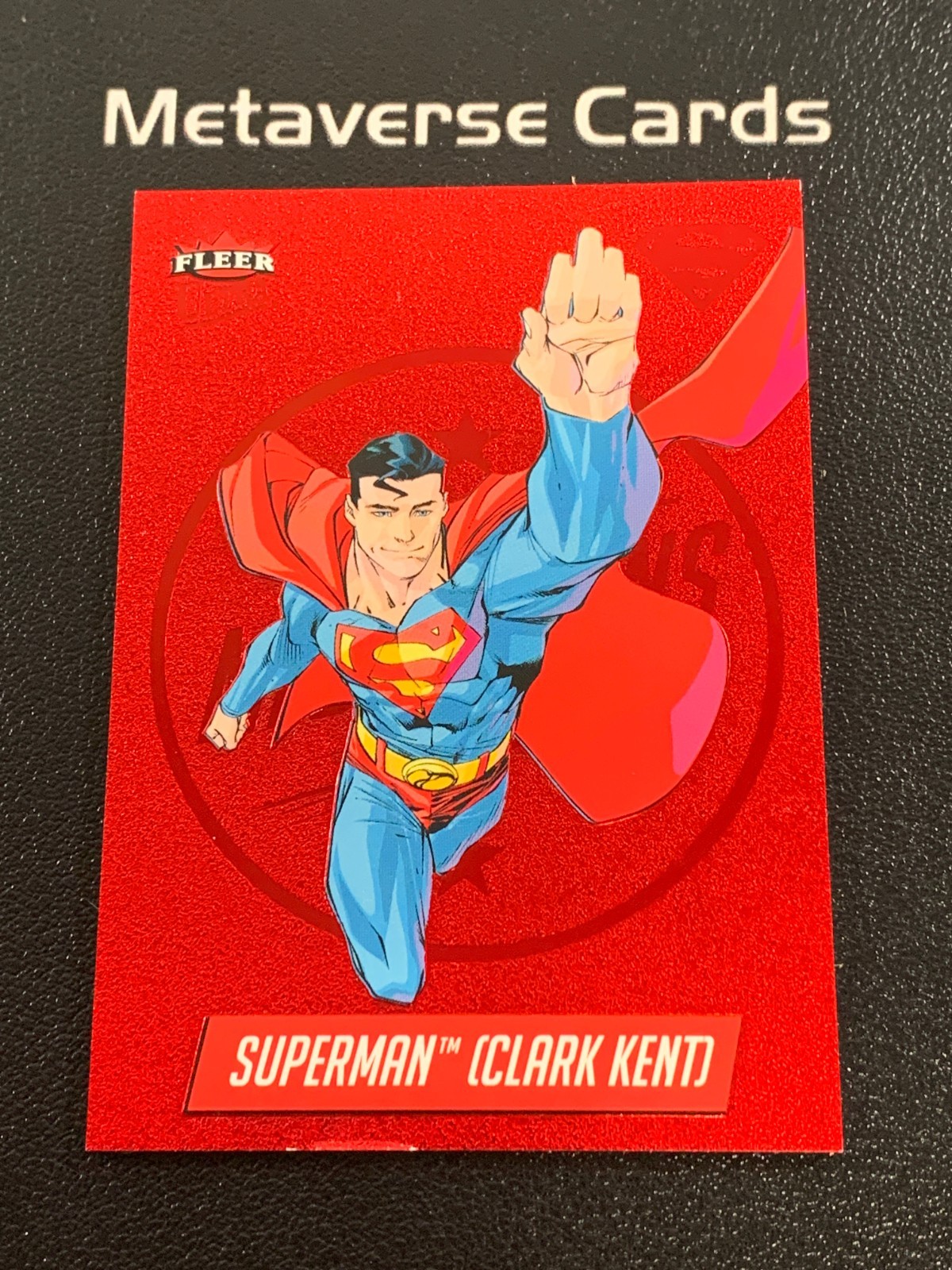 2025 Fleer Ultra Superman Superman Clark Kent 10/50 Ruby Medallions M-1