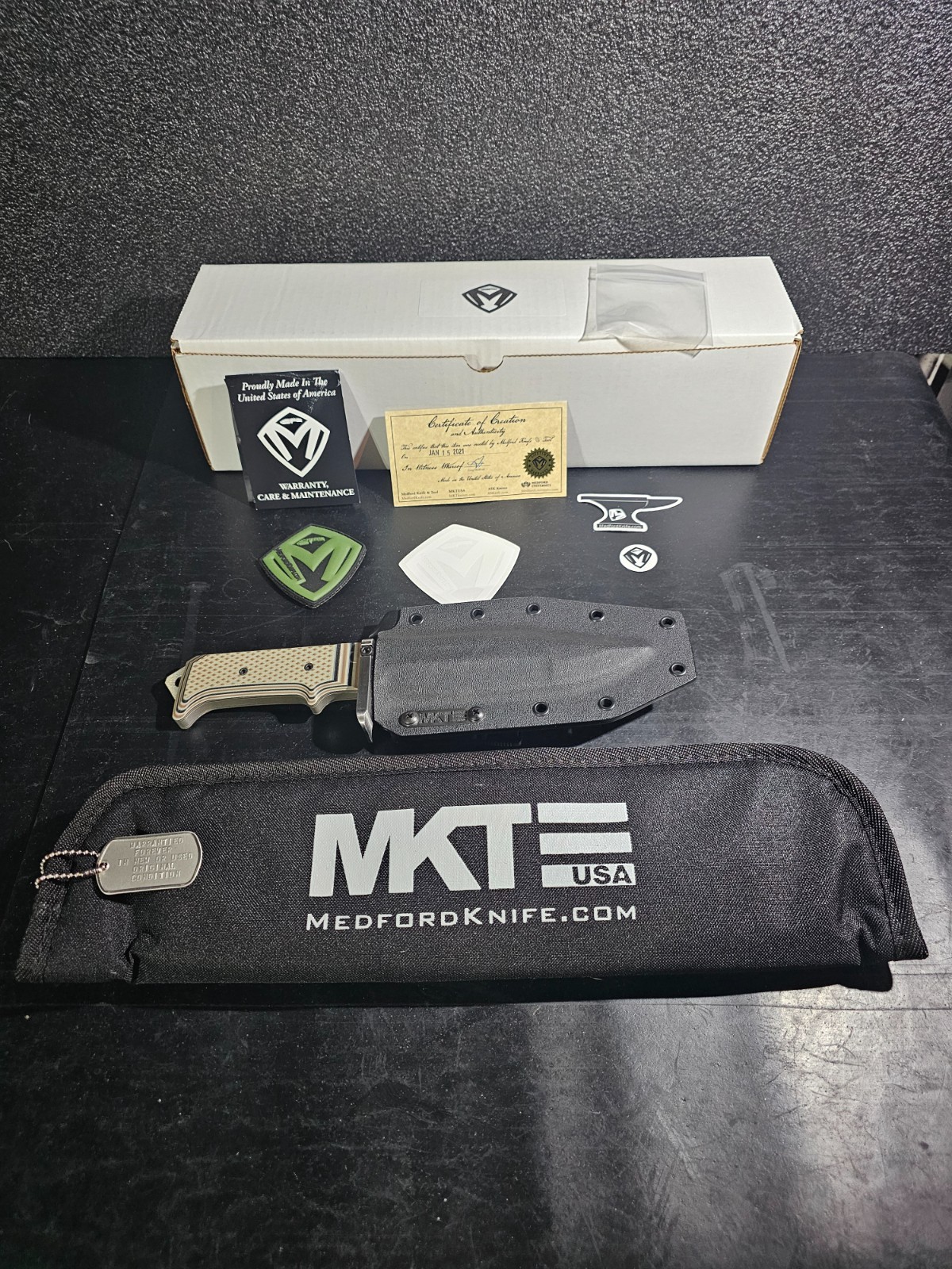 Medford USMC Raider limited run 6 of 32.  Satin Blade and multi color G10 handle