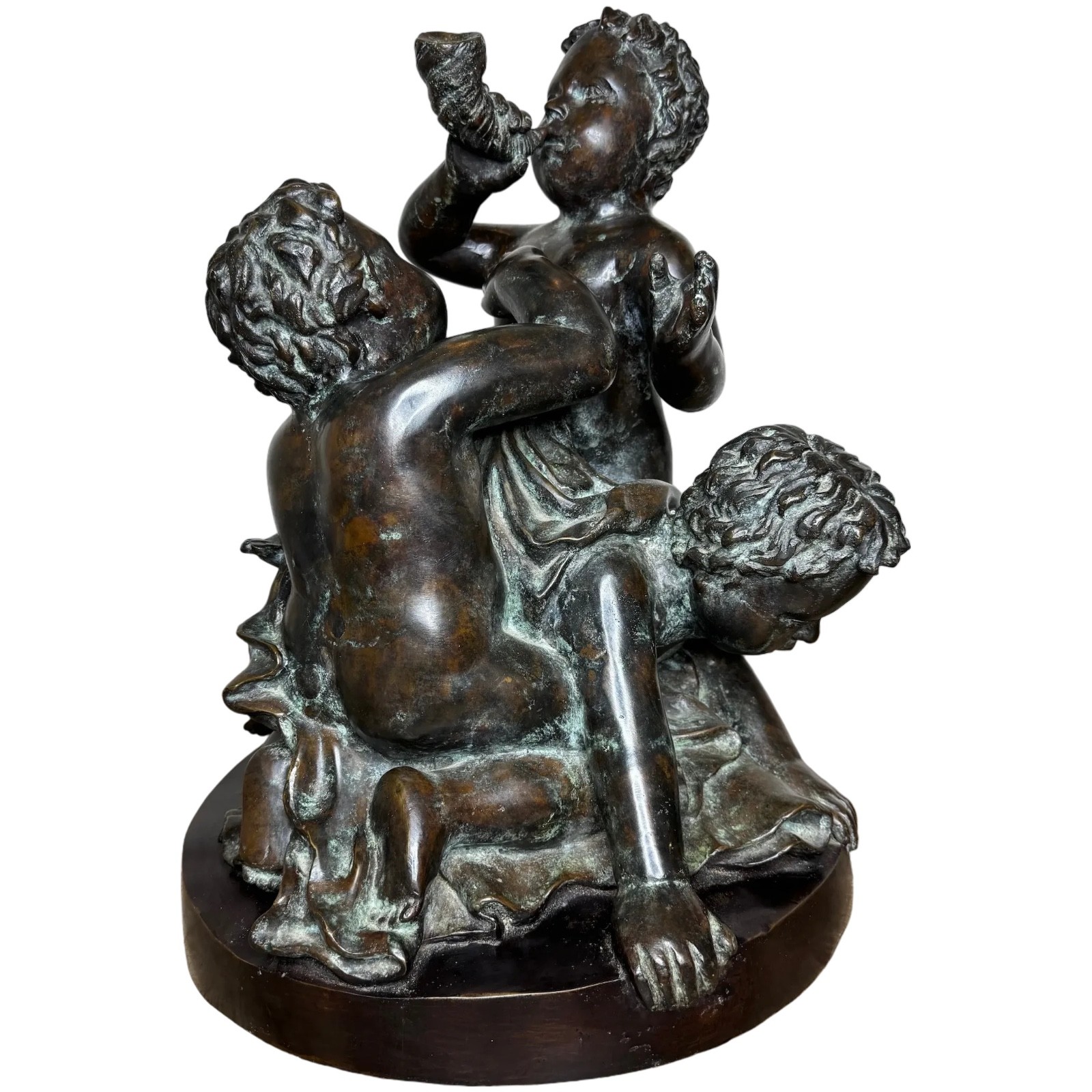 Bronze group calls de Triton conque mer putti in the manner of Claude Michel Bronze group calls de Triton conque mer putti in the manner of Claude Michel