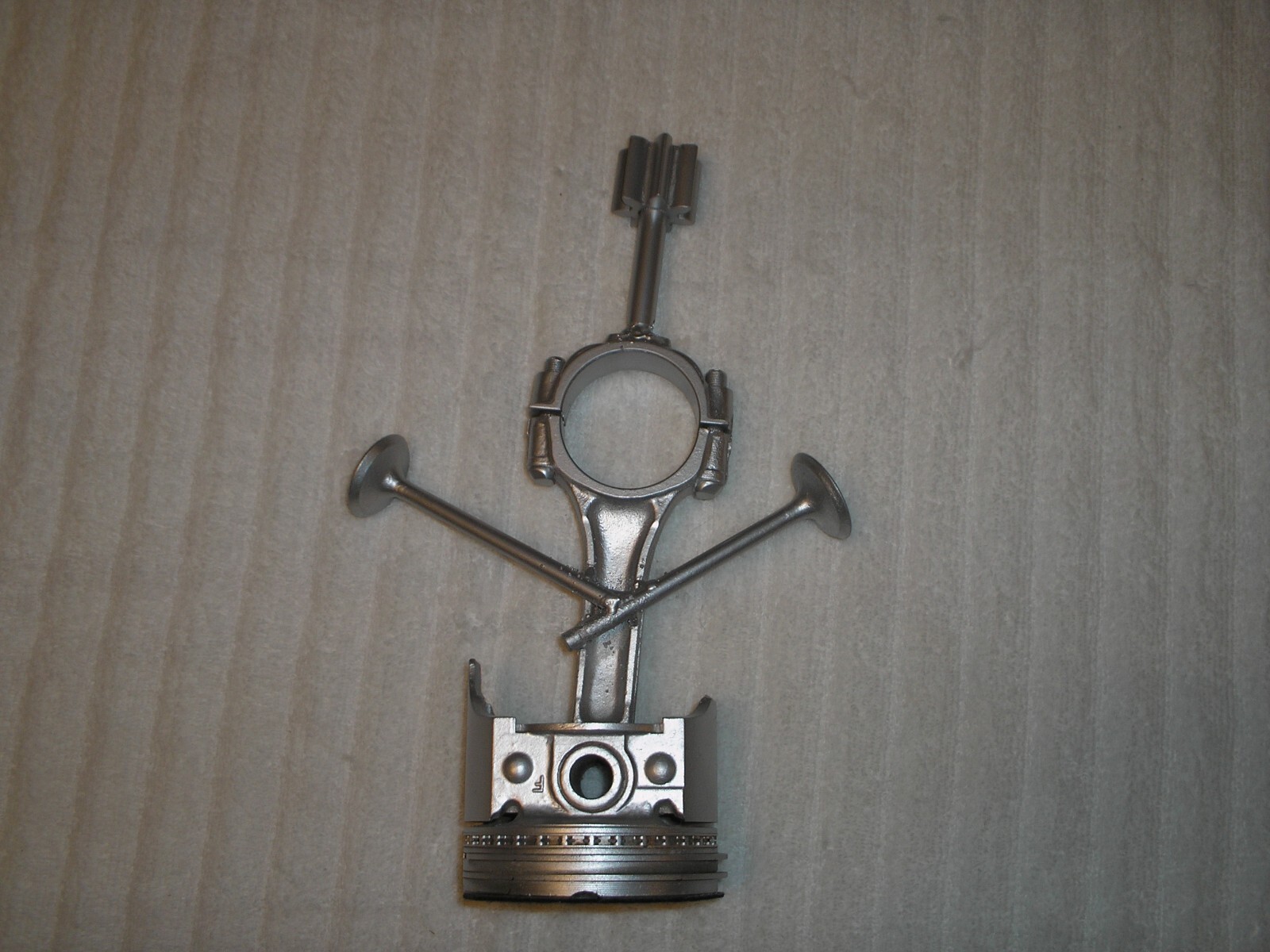 This is a Piston art ornament made from a rod & valve's This is a Piston art ornament made from a rod & valve's