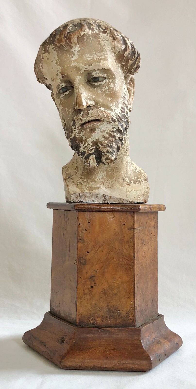 An Early 18th c Spanish Colonial Carved Wooden Head of a Saint. Fragment on Base An Early 18th c Spanish Colonial Carved Wooden Head of a Saint. Fragment on Base
