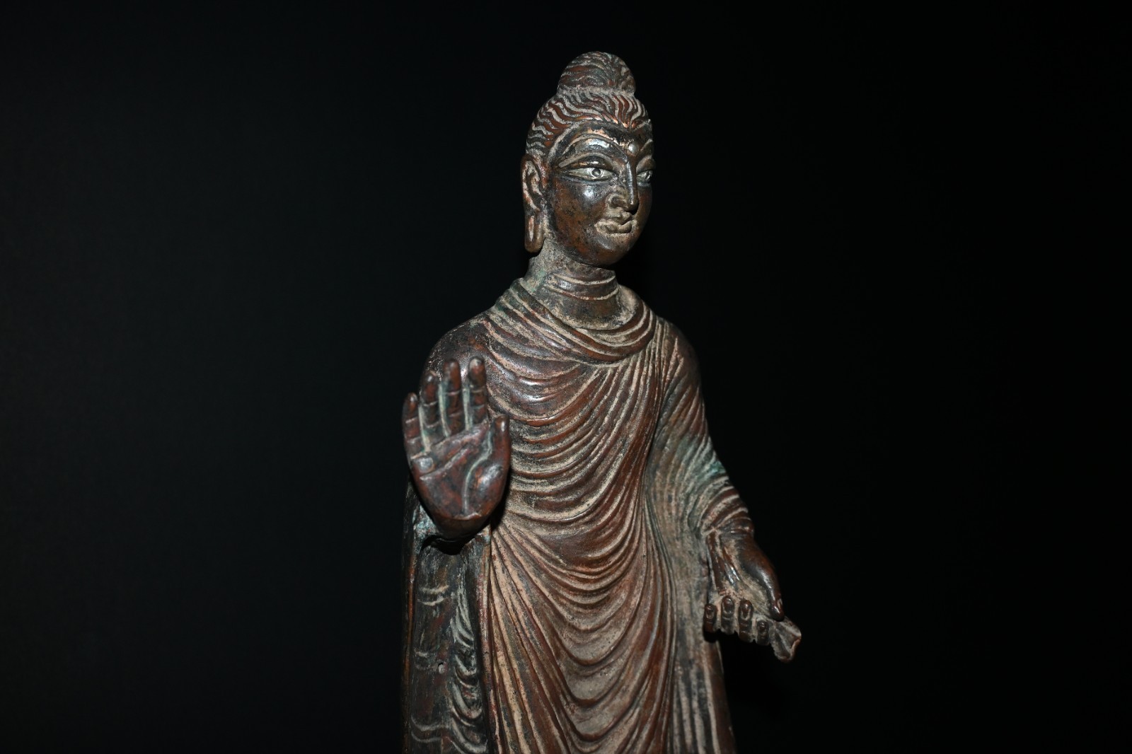 CIRCA NEAR EASTERN A GANDHARA BRONZE STANDING STAUE OF BUDDHA, SILVERED EYES