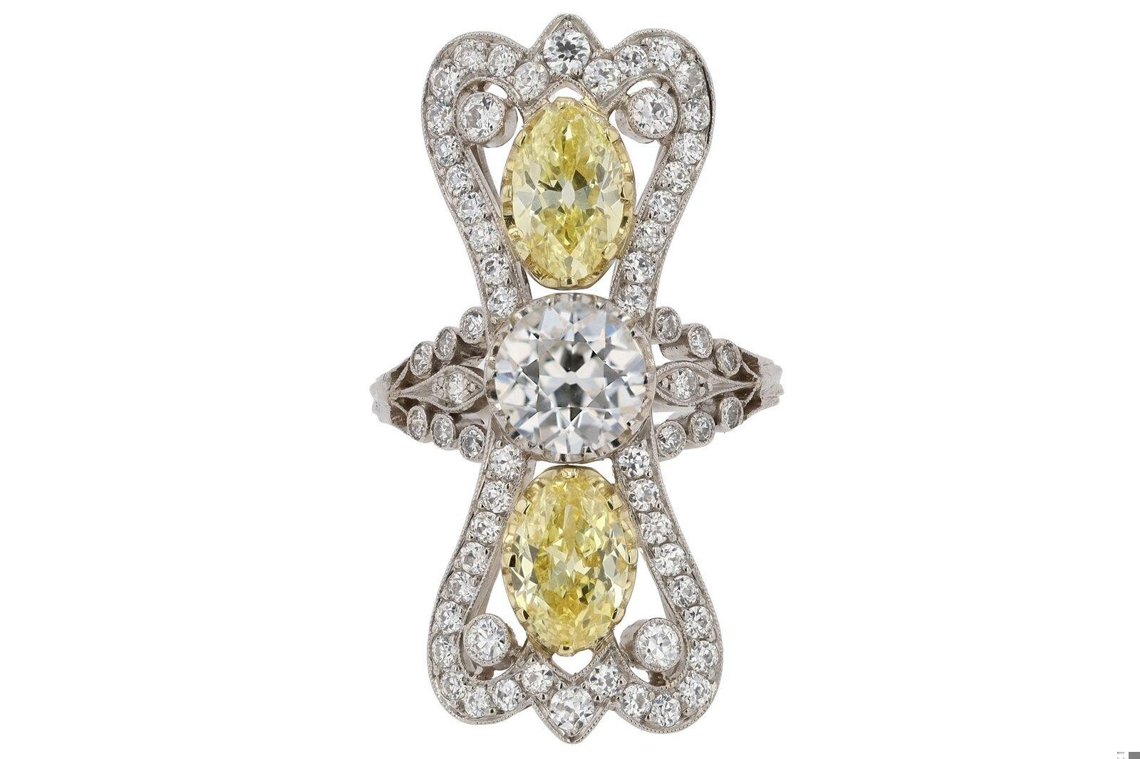 GIA Certified 3.41 Carat Three Stone Yellow Antique Diamond Cocktail Ring GIA Certified 3.41 Carat Three Stone Yellow Antique Diamond Cocktail Ring