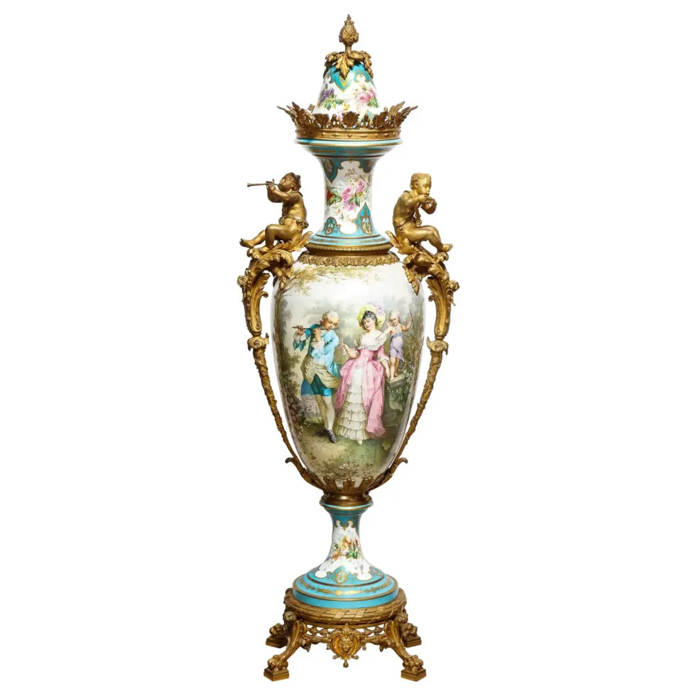 A Palatial French Ormolu-Mounted Sevres Porcelain Hand-Painted Vase and Cover A Palatial French Ormolu-Mounted Sevres Porcelain Hand-Painted Vase and Cover