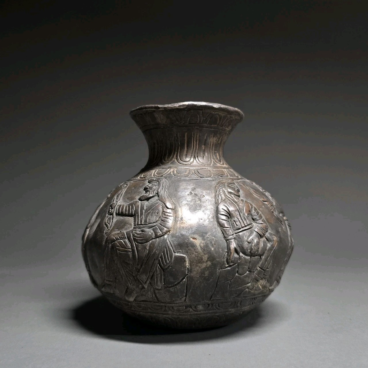 CIRCA NEAR EASTERN SCYTHIAN SILVER RITUAL VESSEL WITH SCENES OF EARLY HERCULES.