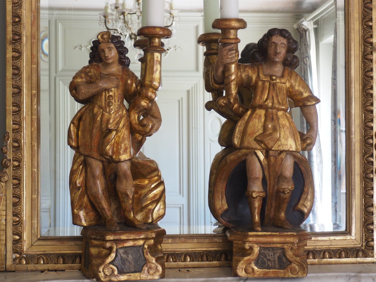 A Large Pair of Baroque Late 17th Century Gilt & Polychrome Decorated Torcheres A Large Pair of Baroque Late 17th Century Gilt & Polychrome Decorated Torcheres