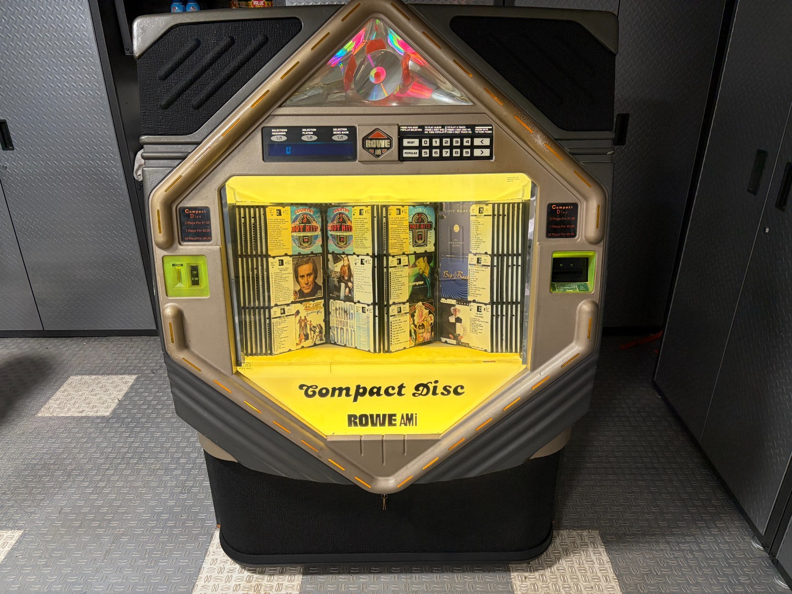 Rowe AMI CD100-E Jukebox. Includes 100 CD's with Title Strips Rowe AMI CD100-E Jukebox. Includes 100 CD's with Title Strips
