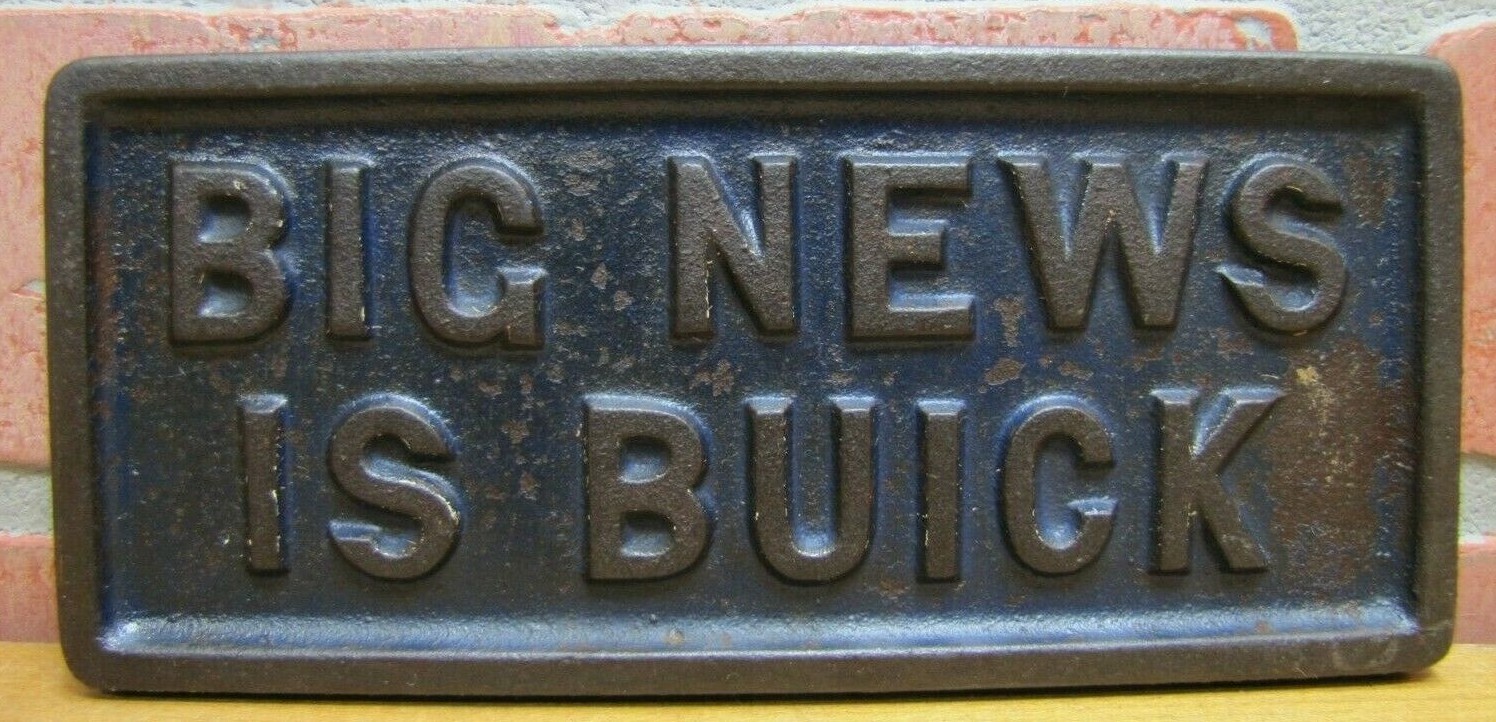 BIG NEWS IS BUICK Old Cast Iron News Stand Newspaper Paperweight Sign Auto Ad