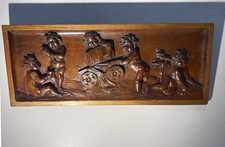 Authentic 17th century Renaissance period carved walnut panel depicting putti. picture