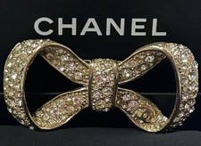Chanel B12P Ribbon Rhinestone Gold Brooch 3x6cm Used picture