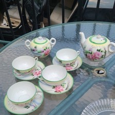 Floral Porcelain Tea Set with Teapot, Cups, and Saucers picture