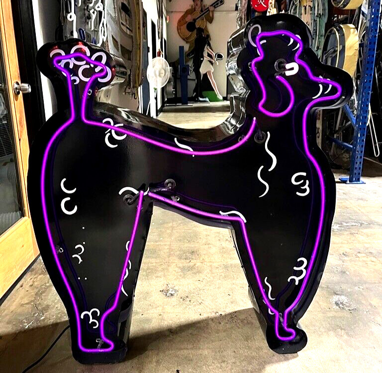 Used Neon Poodle- Double sided metal cabinet- All working Used Neon Poodle- Double sided metal cabinet- All working