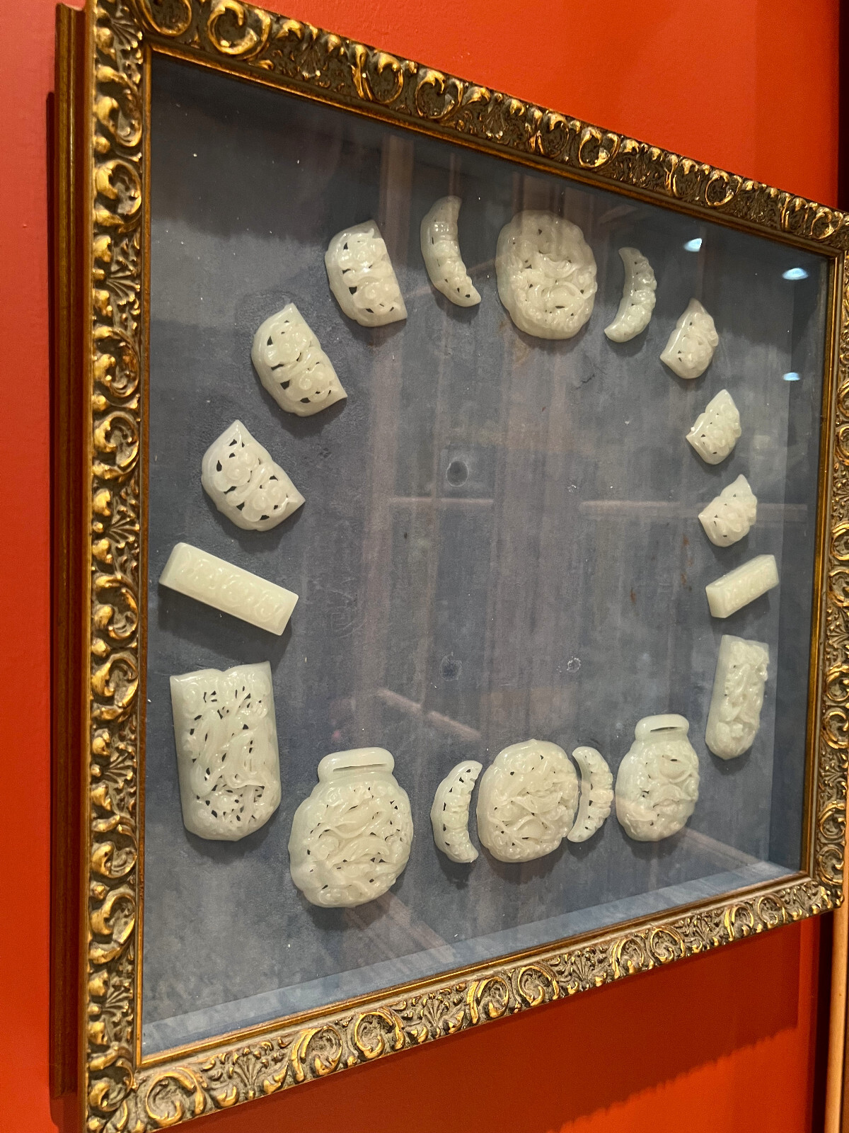 A Set Of Eighteen Carved White Jade Belt Plaques, Qing Dynasty. 
